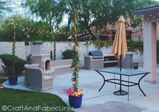 patio lights attached to concrete pots